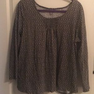 3/4 sleeve t-shirt in multicolored print.